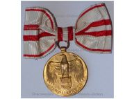 Austria WWI Commemorative Medal without Swords for Non Combatants by Grienauer on Ladies Bow for Female Recipients