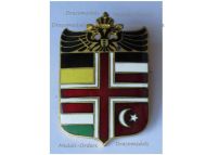 Austria Hungary WWI Cap Badge Shield with the Central Powers Flags and the Imperial Double Headed Eagle
