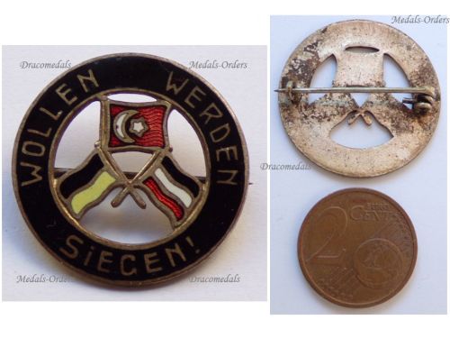 Austria Hungary WWI Cap Badge Wollen Werden Siegen with the Central Powers Flags