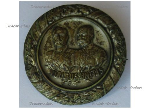 Austria Hungary WWI Cap Badge with the United Kaisers Franz Joseph I Wilhelm II Inscribed Viribus Unitis